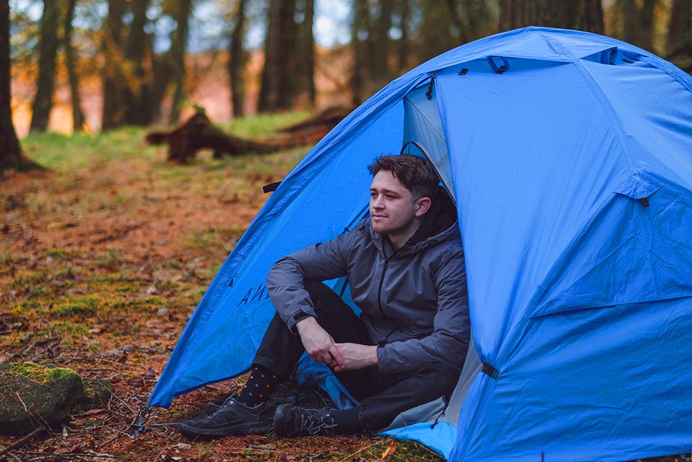 Man sat in tent (6649448792137)