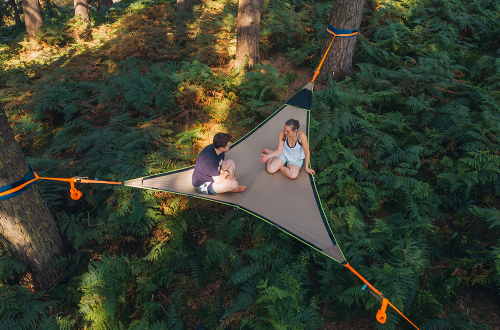 man and woman in camping hammock (6649461112905)