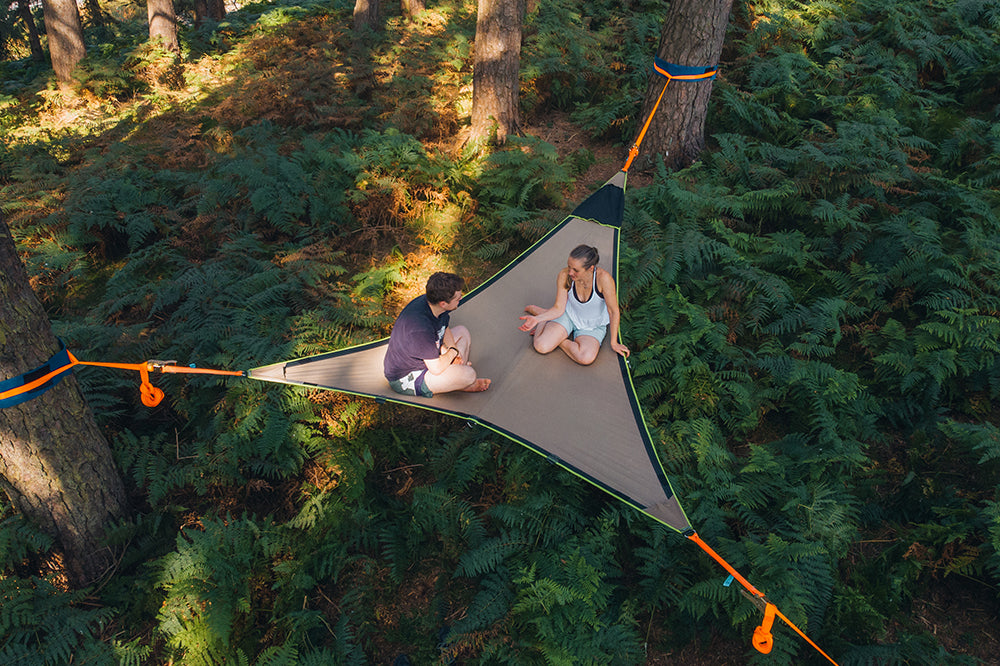 man and woman in camping hammock (6649461112905)