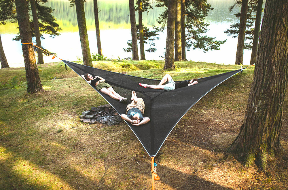 men and women laid in mesh camping hammock (4373048033353)