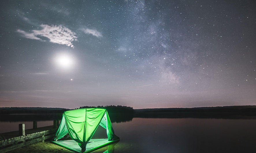 universe tree tent on water illuminated at night (2033231036489)