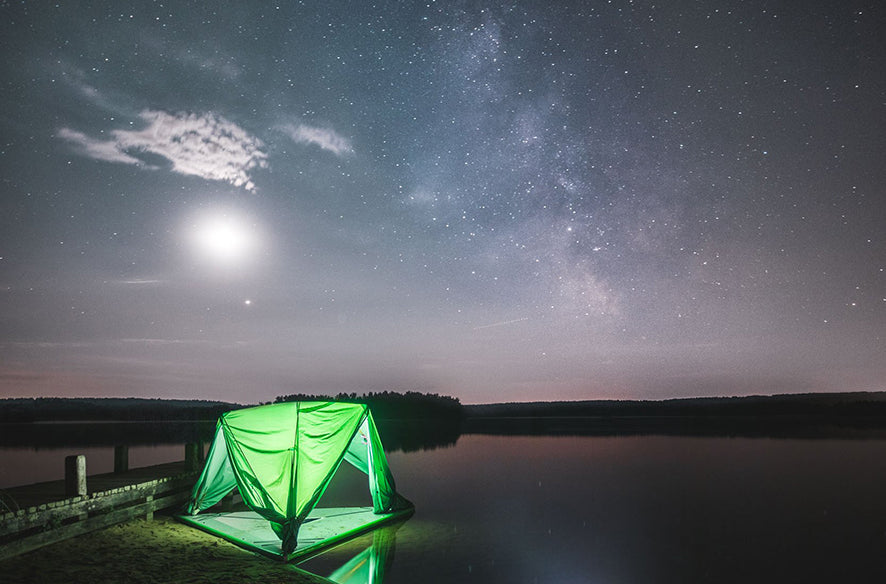universe tree tent on water illuminated at night (2033231036489)