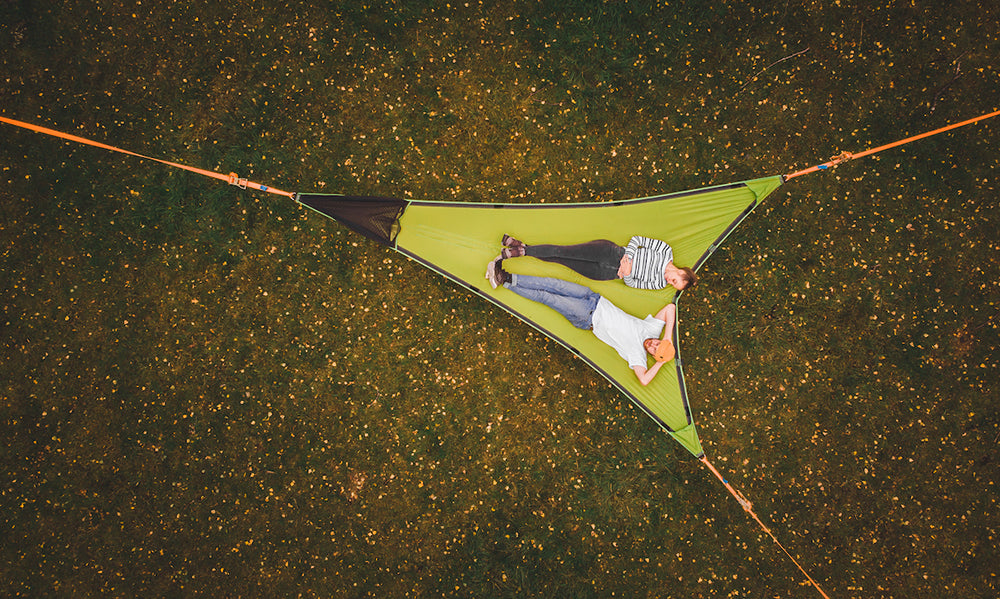 couple laid in camping hammock (4553640378441)