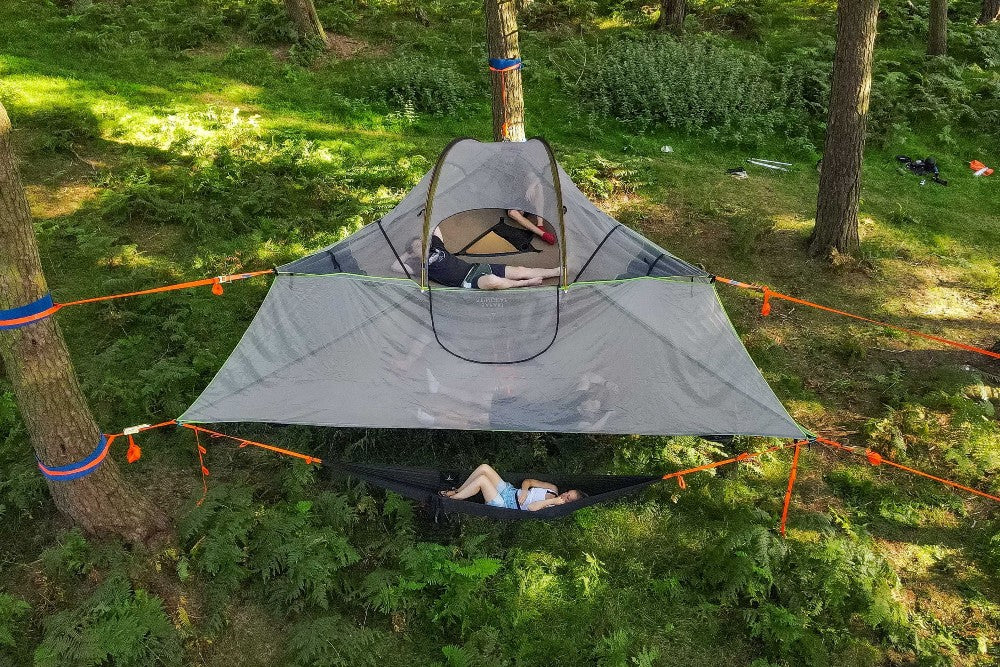 Friends camping in suspended tree tent (6793570680905)