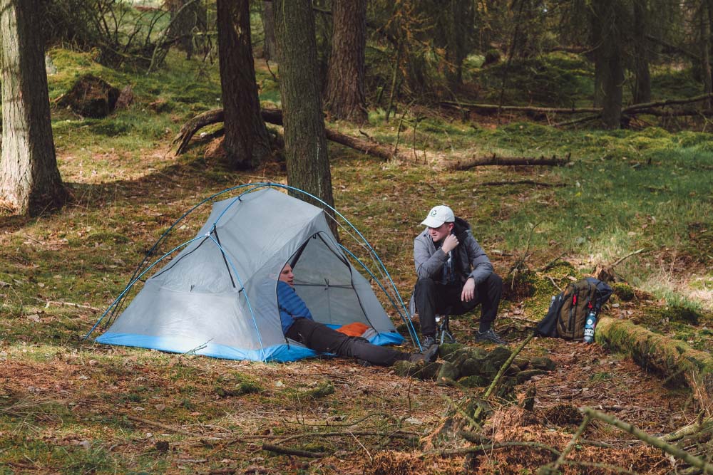 men at campsite (6649448792137)