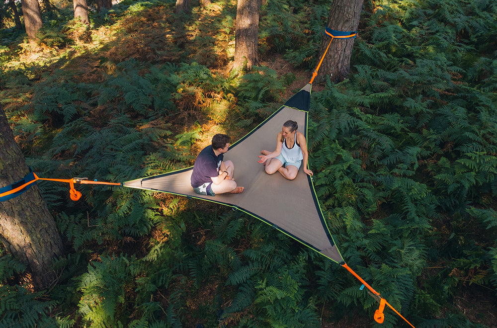 man and woman in camping hammock (6649461112905)